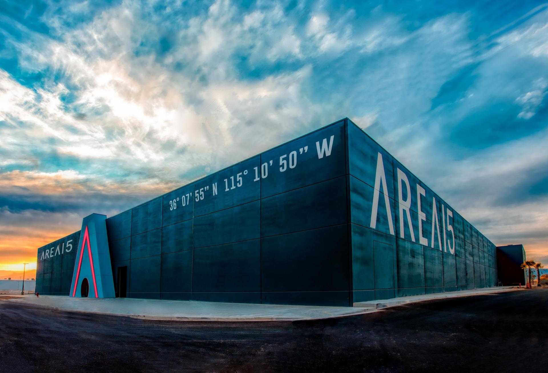 An image of AREA15 with a striking, colorful sky as a backdrop.
