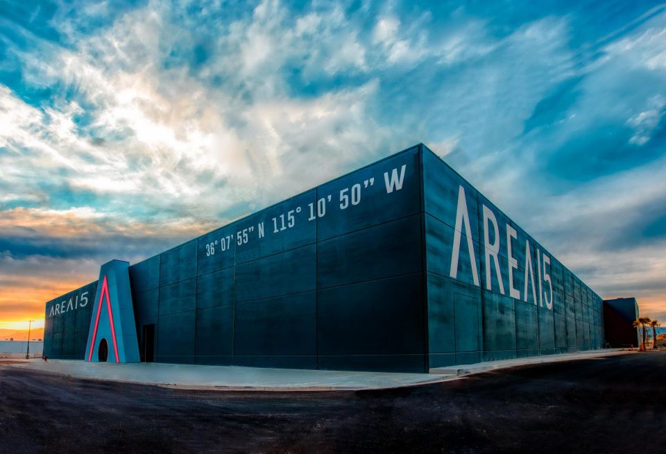 An image of AREA15 with a striking, colorful sky as a backdrop.