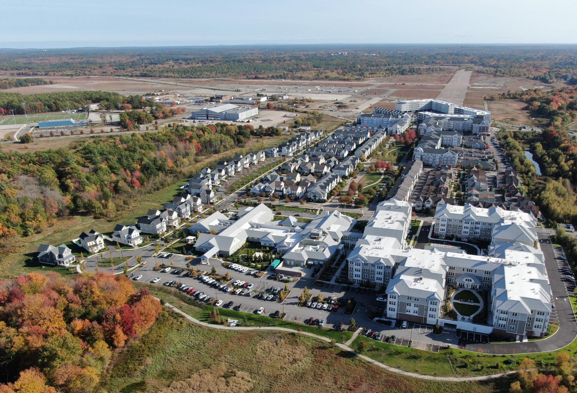 The 1,400-acre South Weymouth Naval Air Station site, with existing residential development in the foreground and future construction sites in the background.