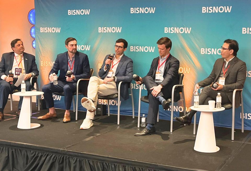 Herrick's Yariv Ben-Ari, Peachtree Group's Michael Bernath, BHI's Andrew Gruseke, Cain's John Basting and Palette Hotels' Joseph Yi onstage at Bisnow's 2026 National Hospitality Conference.