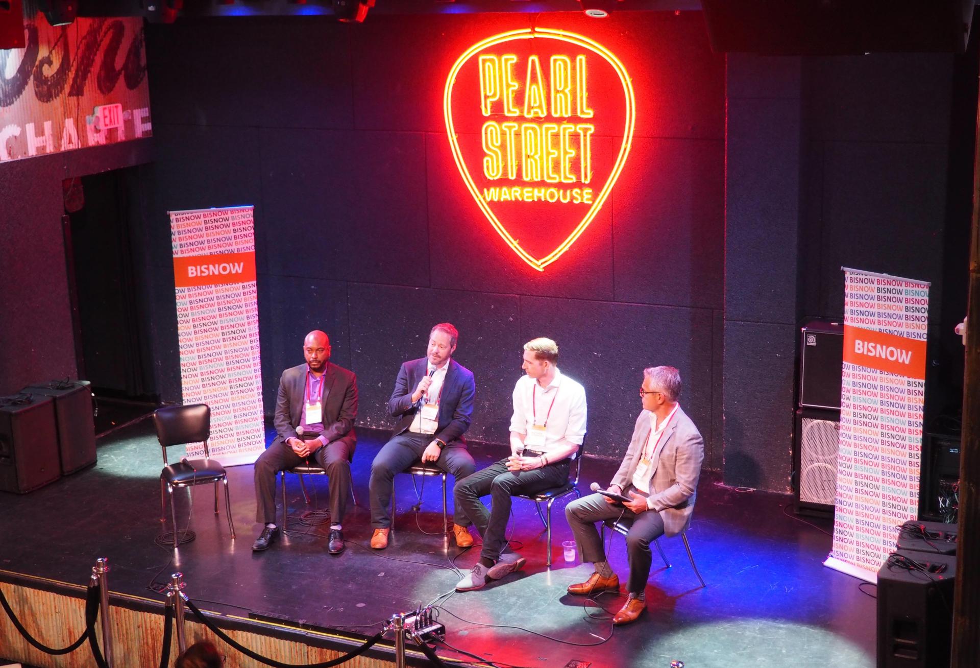 Delta Associates' Will Rich, Akridge's Adam Gooch, Hoffman & Associates' Matthew Steenhoek and JLL's James Renne speak during a panel at Bisnow's Buzzard Point, Ballpark and Capital Riverfront CRE Opportunities event on Aug. 16 2022.