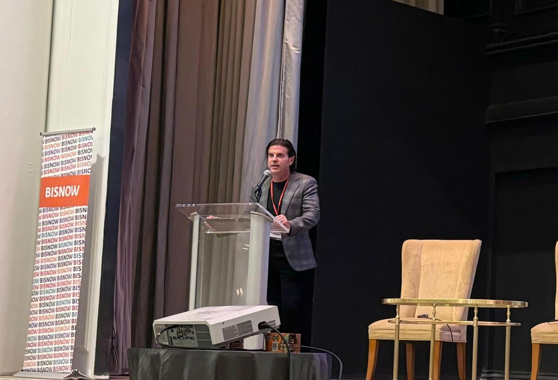 David Adelman of 76 Place addresses Bisnow crowd