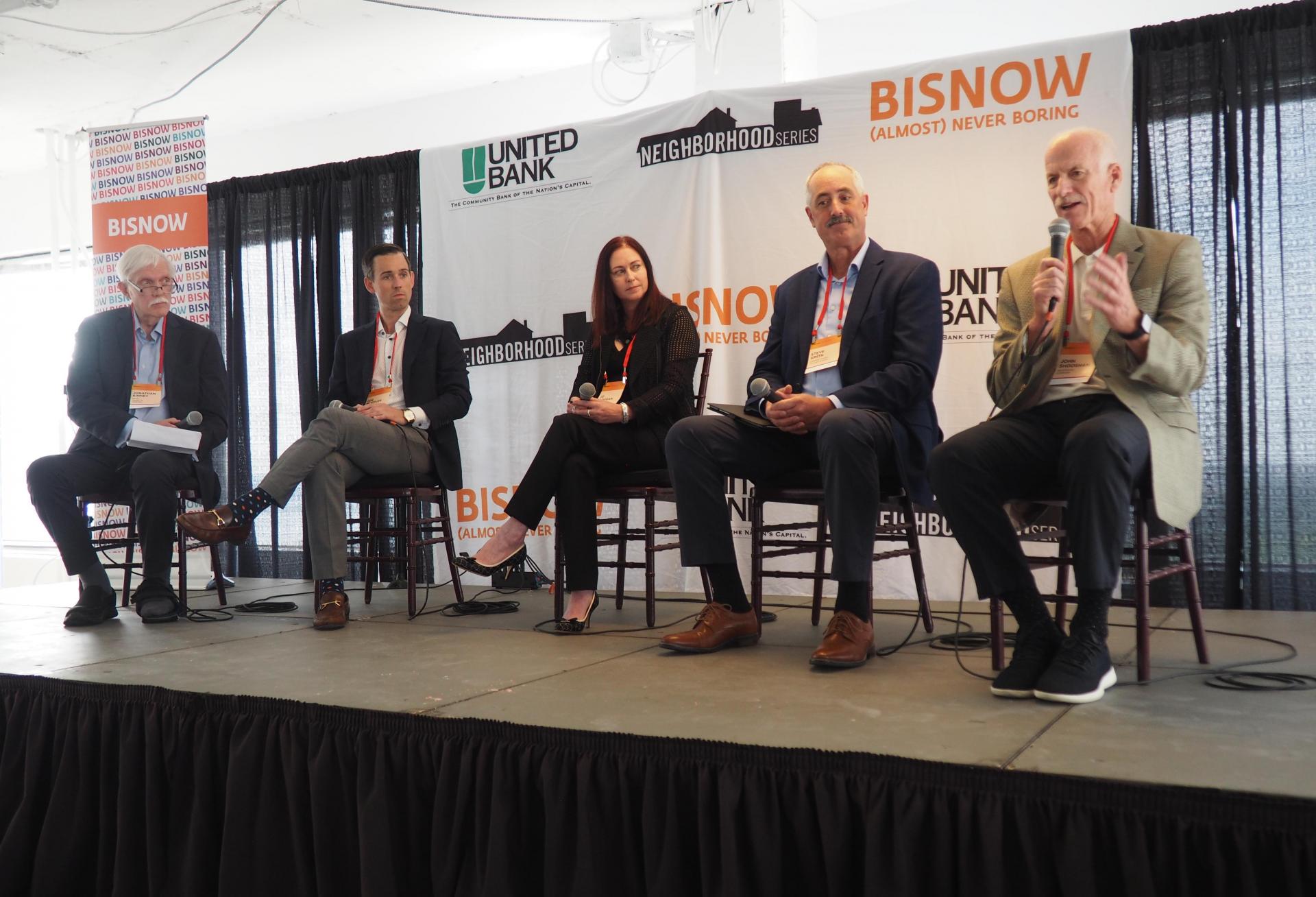 Bean Kinney & Koman's Jonathan Kinney, Mill Creek Residential's Joe Muffler, Bozzuto's Jo Gavigan, Cooper Carry's Steve Smith and Shooshan Co.'s John Shooshan, speak during a panel at Bisnow's Future of Arlington County event.
