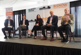 Bean Kinney & Koman's Jonathan Kinney, Mill Creek Residential's Joe Muffler, Bozzuto's Jo Gavigan, Cooper Carry's Steve Smith and Shooshan Co.'s John Shooshan, speak during a panel at Bisnow's Future of Arlington County event.
