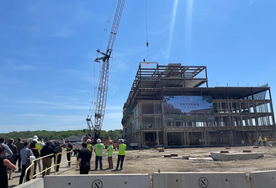The topping off ceremony held Wednesday for the first building in Northland's Pattern District redevelopment.