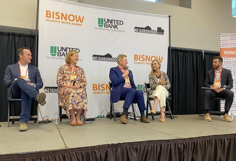 Comstock's Tim Steffan, Rappaport's Susan Bourgeois, Knutson Cos.' Donald Knutson, USTA Mid-Atlantic Section's Beth Twomey and Walsh Colucci's Mike Romeo speak during a panel at Bisnow's Future of Loudoun County event on Oct. 26, 2022.