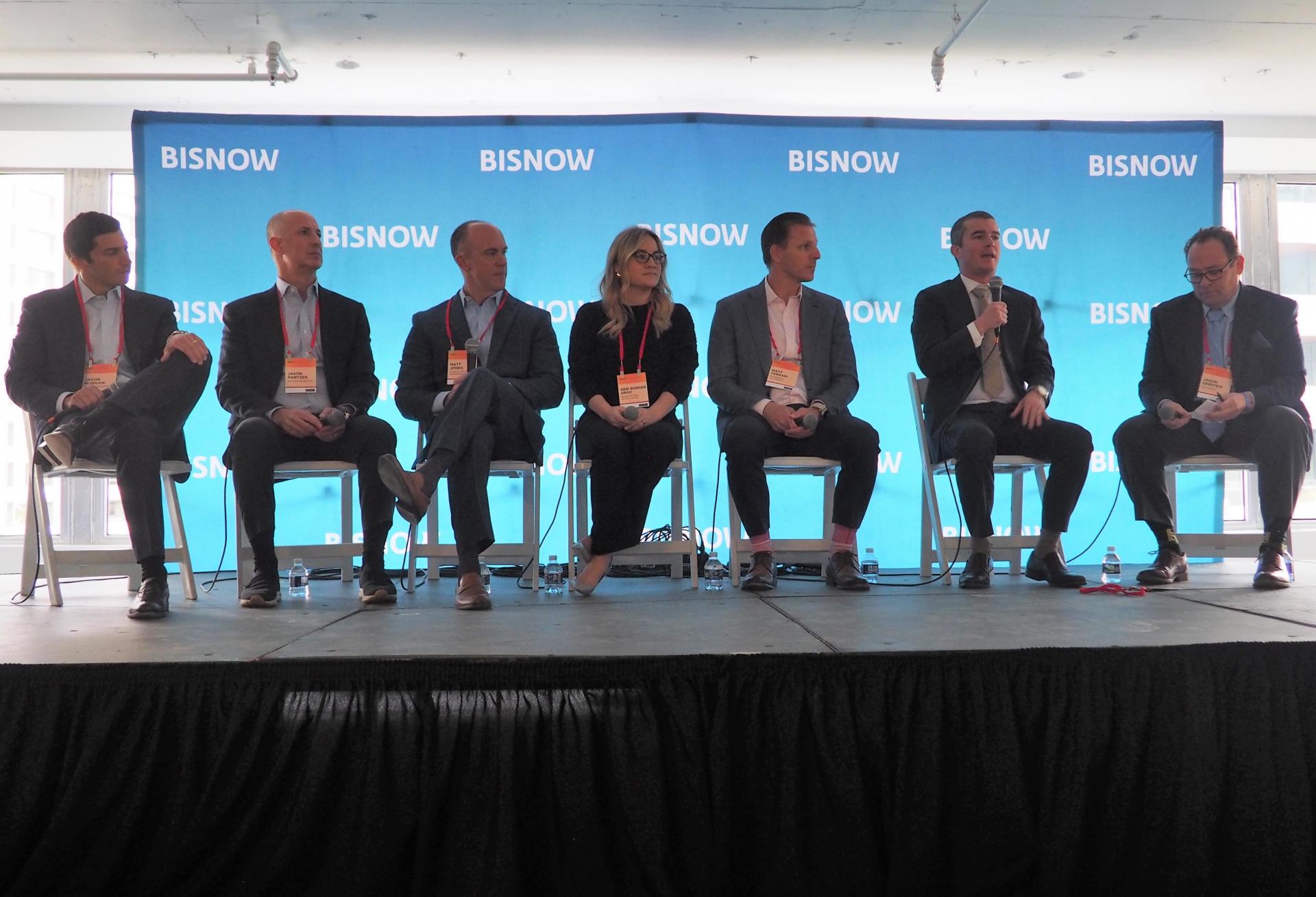 Morgan Properties' Jason Morgan, Pantzer Properties' Jason Pantzer, Harbor Group International's Matt Jones, NewPoint Real Estate Capital's Geri Borger Urgo, TruAmerica Multifamily's Matt Ferrari, Archway Capital's Tom Noble and LGA Capital's Jason Gerstein speak during a panel at Bisnow's Multifamily Annual Conference on Nov. 29, 2022.