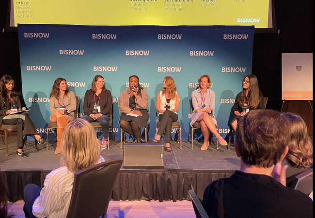 A photograph of the Denver Women Leading Real Estate panel.