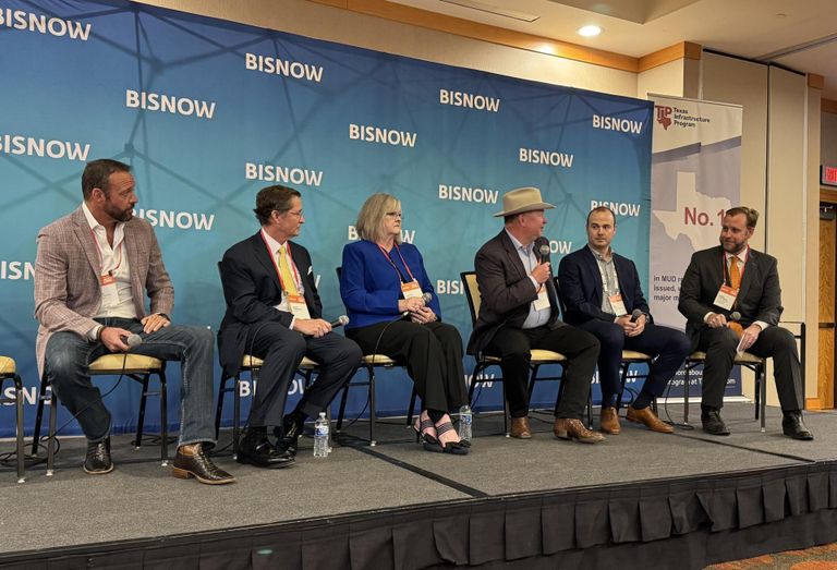 Speakers on panel at Bisnow's 2026 Houston Master Planned Communities event.