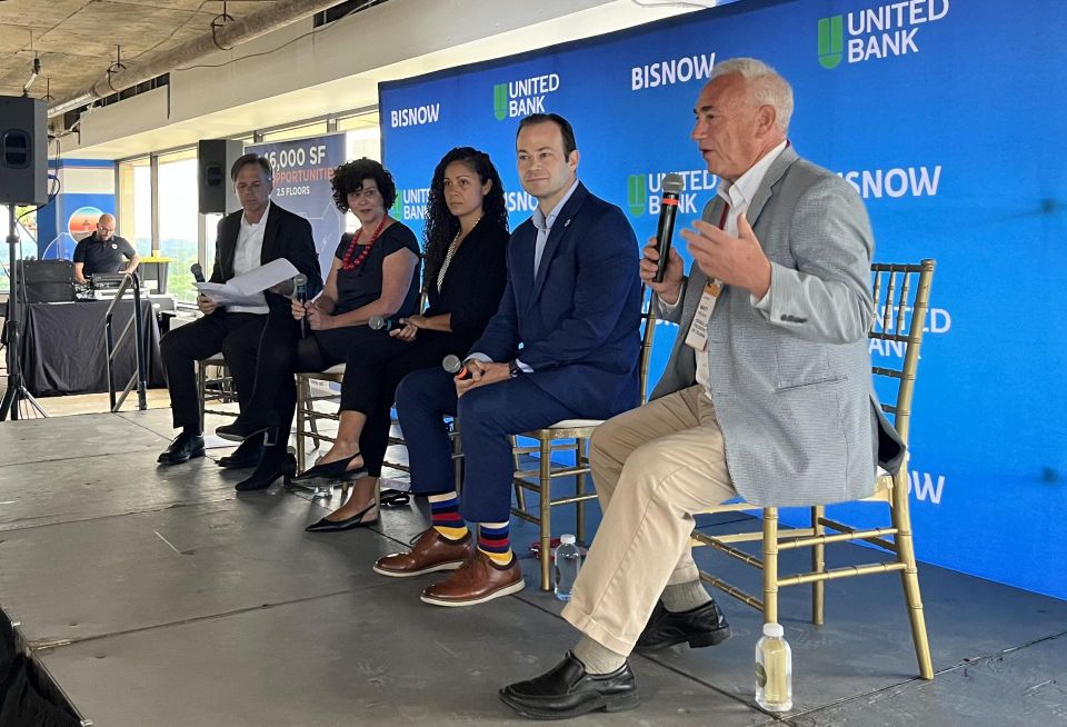 Friendship Heights Alliance Board Member Chapman Todd, Friendship Heights Alliance Executive Director Natalie Avery, Somerset Development Co.'s Anya Kamara, Montgomery County Council Member Andrew Friedson and D.C. Council Member Matt Frumin.