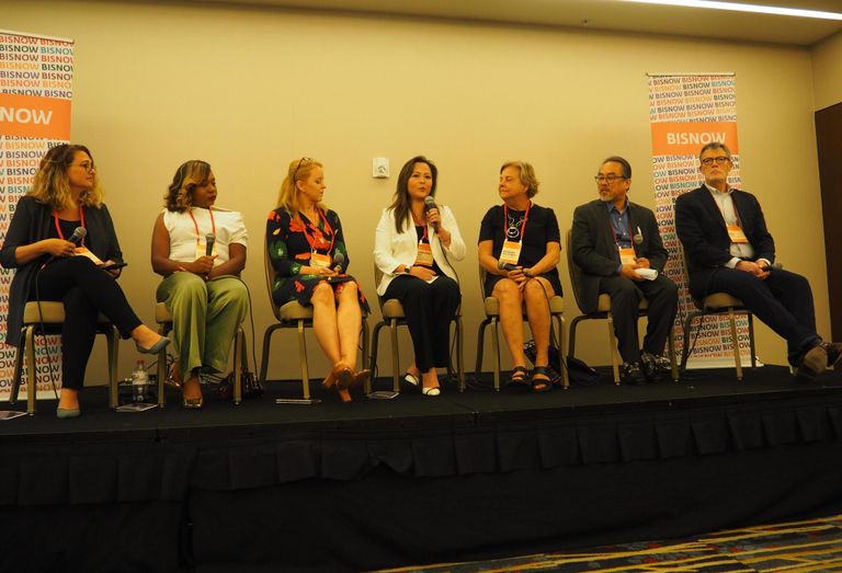 Jacobs' Andie Moeder, Dantes Partners' Tessa Hall, Lighting Environments' Erin McDannald, Bozzuto Construction Company's Christine Wu, Perkins Eastman's Barbara Mullenex, and FOX Architects' Bob Fox speak during a panel at Bisnow's Architecture & Design Summit on Aug. 18, 2022.