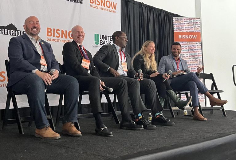Deputy Mayor John Falcicchio, Hines Senior Managing Director Andrew McGeorge, JPMorgan Chase Executive Director of Global Real Eestate D'Juan O'Donald, Pirate Ventures cofounder Anna Valero and Acumen Companies Chairman AZ Abiud speak during a panel at Bisnow's The Future of Downtown D.C. & The Golden Triangle event on March 31, 2022.