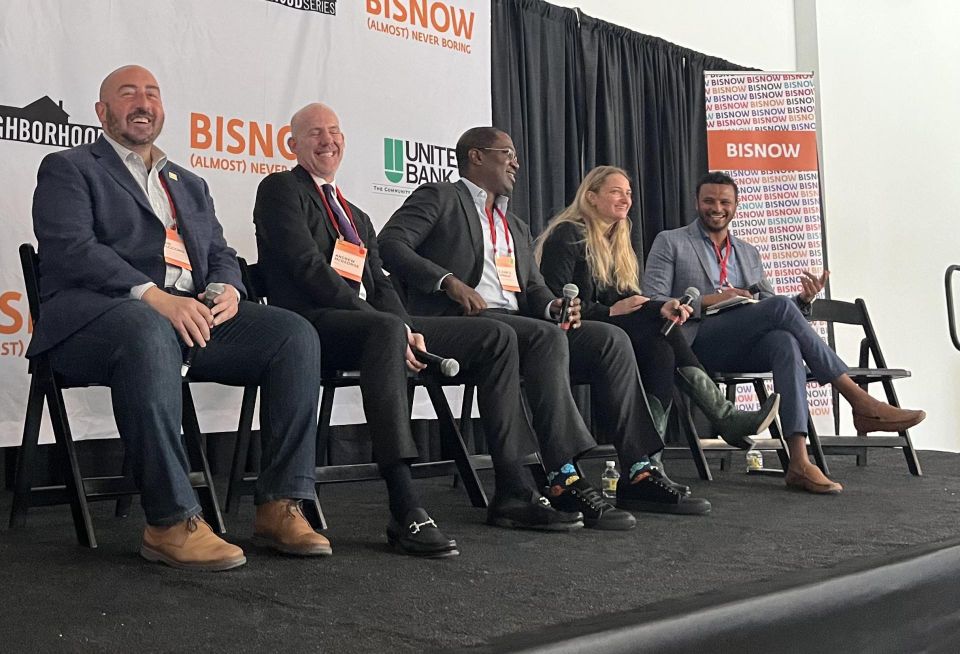 Deputy Mayor John Falcicchio, Hines Senior Managing Director Andrew McGeorge, JPMorgan Chase Executive Director of Global Real Eestate D'Juan O'Donald, Pirate Ventures cofounder Anna Valero and Acumen Companies Chairman AZ Abiud speak during a panel at Bisnow's The Future of Downtown D.C. & The Golden Triangle event on March 31, 2022.