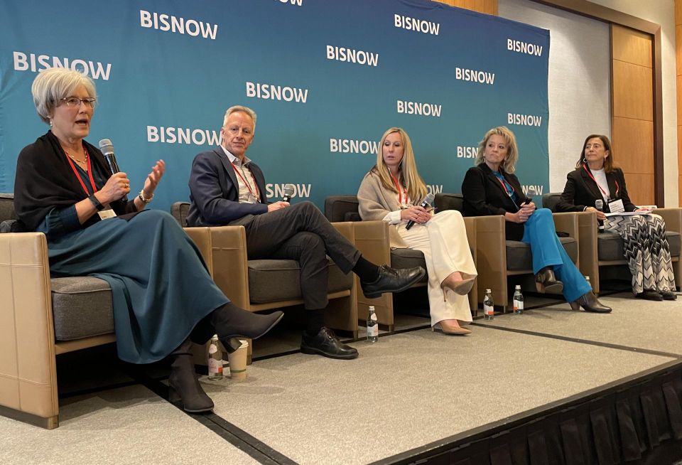 Children's Hospital's Suzy Jaeger speaks at Bisnow's 2024 Denver Healthcare Summit. Other panelists are Ryan Companies' Mike McMahan, Design Studio Blue's Rebecca Brennan, Denver Health's Kris Gaw, Women's Leadership Foundation's Tracey Campbell