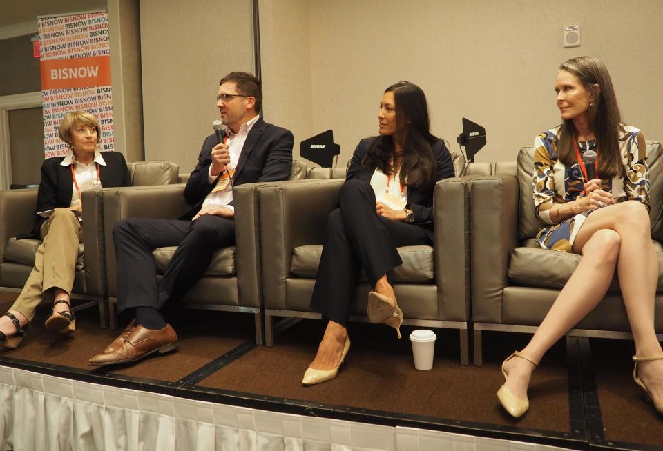 Walsh Colucci Lubeley & Walsh's Elizabeth Baker, Fairfax County Economic Development Authority's Alex Iams, Hoffman & Associates' Robin Bettarel and Federal Realty's Deirdre Johnson speak during a panel at Bisnow's Fairfax State of the Market event on Aug. 23, 2022.