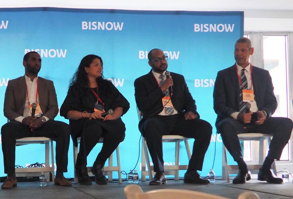 Walker & Dunlop's John Gilmore, Builders Patch's Kanan Ajmera, DHCD's Drew Hubbard and Colliers Mortgage's Tabaré Borbón speak during a panel at Bisnow's Multifamily Annual Conference on Nov. 29, 2022.