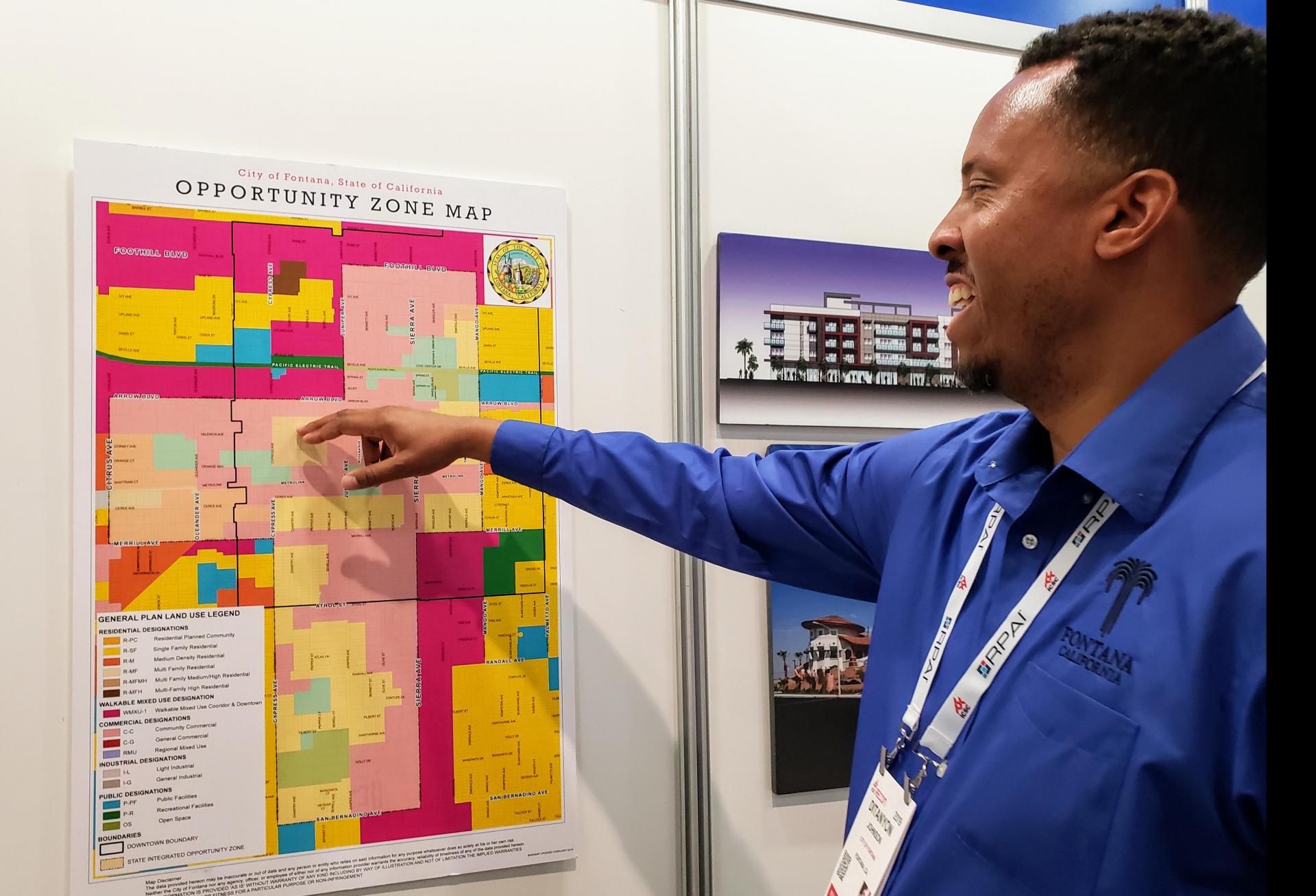 Fontana Senior Planner DiTanyon Johnson shows a map of the designated opportunity zone areas in the city.