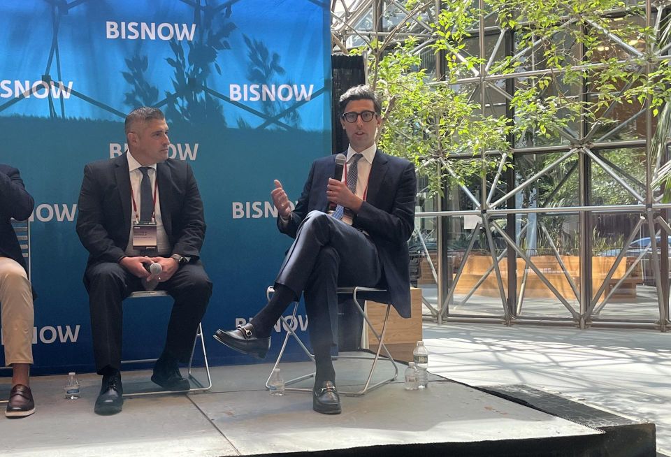 Hunton Andrews Kurth's Matthew Scoville and Related Cos. Sam Friedland onstage at Bisnow's 2023 National Commercial Real Estate Finance Conference.