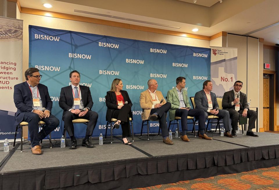 Speakers on panel at Bisnow's 2026 Houston Master Planned Communities event.