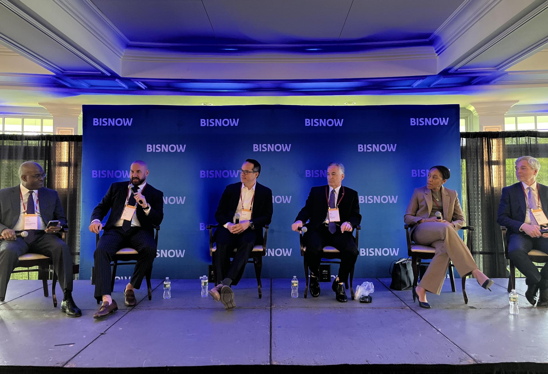 Westchester County's Ken Jenkins, Kings Capital Group's JD Summa, RXR & Red Oak Street's David Garten, H2M Architects + Engineers Jay Pisco, New Rochelle Mayor Yadira Ramos-Herbert and White Plains Mayor Thomas Roach onstage at Bisnow's 2024 Westchester State Of The Market event.