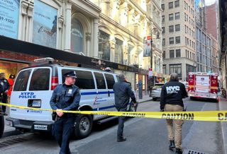 The streets surrounding the 57 Ann St. parking garage were closed off following the building collapse, which killed one person and injured four. 