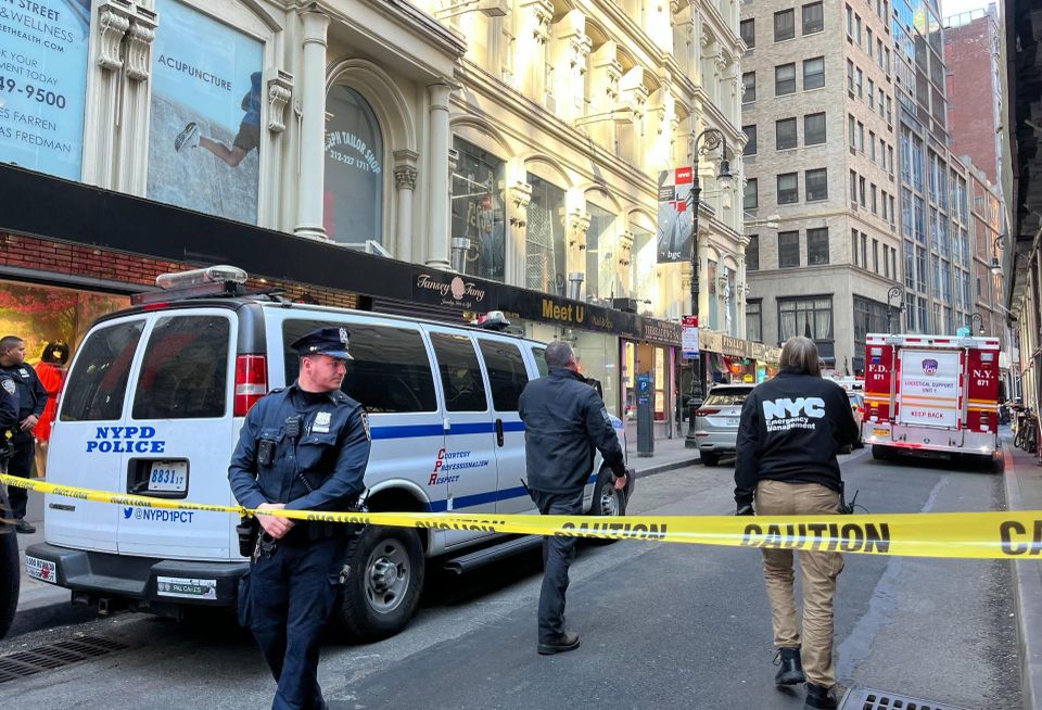The streets surrounding the 57 Ann St. parking garage were closed off following the building collapse, which killed one person and injured four.