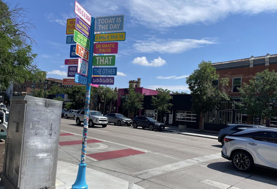 A photograph of the intersection at South Broadway and West Archer Place, close to the Goodwill.