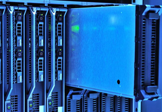 Server racks in a data center environment.
