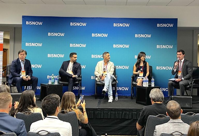 Fortune International Group's Edgardo Defortuna, Apex Capital Realty's Miguel Pinto, Deco Capital's Bradley Colmer, Focus's Vickey Lee and Bilzin Sumberg's Michael LaMoyeux on a panel at Bisnow's Construction and Development conference on May 25, 2023.