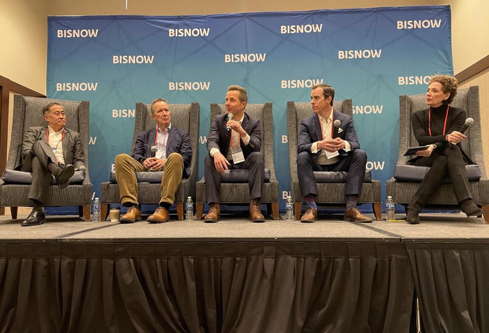 An image of the panelists on the Investment Trends panel at Bisnow's 2025 Forecast event held Jan. 23 at the Embassy Suites Denver Downtown. Riki Hashimoto, Knightbridge Capital; William Grubbs Jr., McWhinney; Peter Merrion, JLL Capital Markets; Matt Teeters, Alpine Bank; and Marcy Moneypenny, Avison Young.