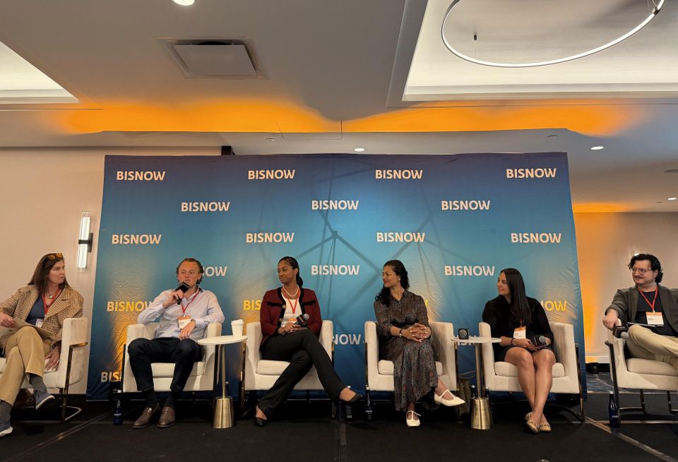 NYC Environmental Protection Deputy Commissioner Angela Licata-Misiak, Ener.co's Ruben Petit, Nucor's Amari Jones, AvalonBay Communities' Guautami Palanki, NYU Langone Health's Jenna Agins and JLL's Adam Fisher onstage at Bisnow's 2026 National Energy and Sustainability conference.