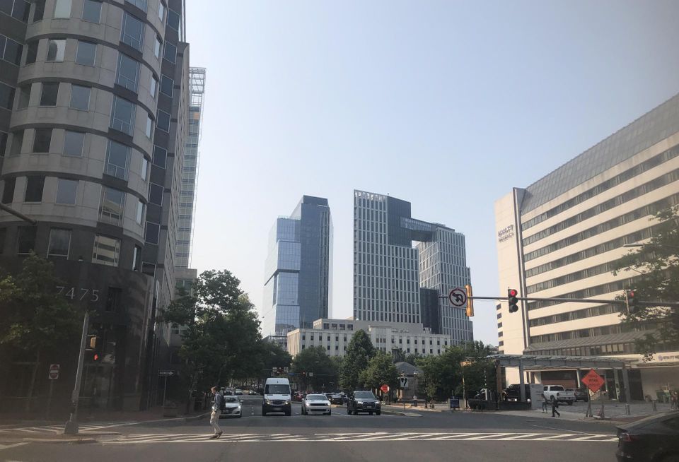 A view looking down Wisconsin Avenue in Bethesda with Carr’s The Wilson and The Elm development in the background.
