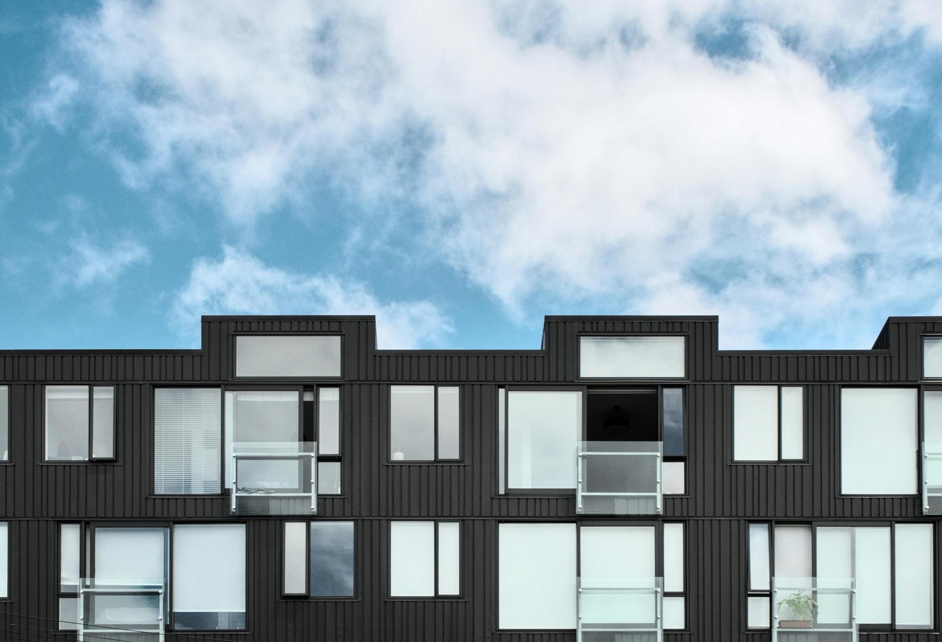 Apartments against blue sky