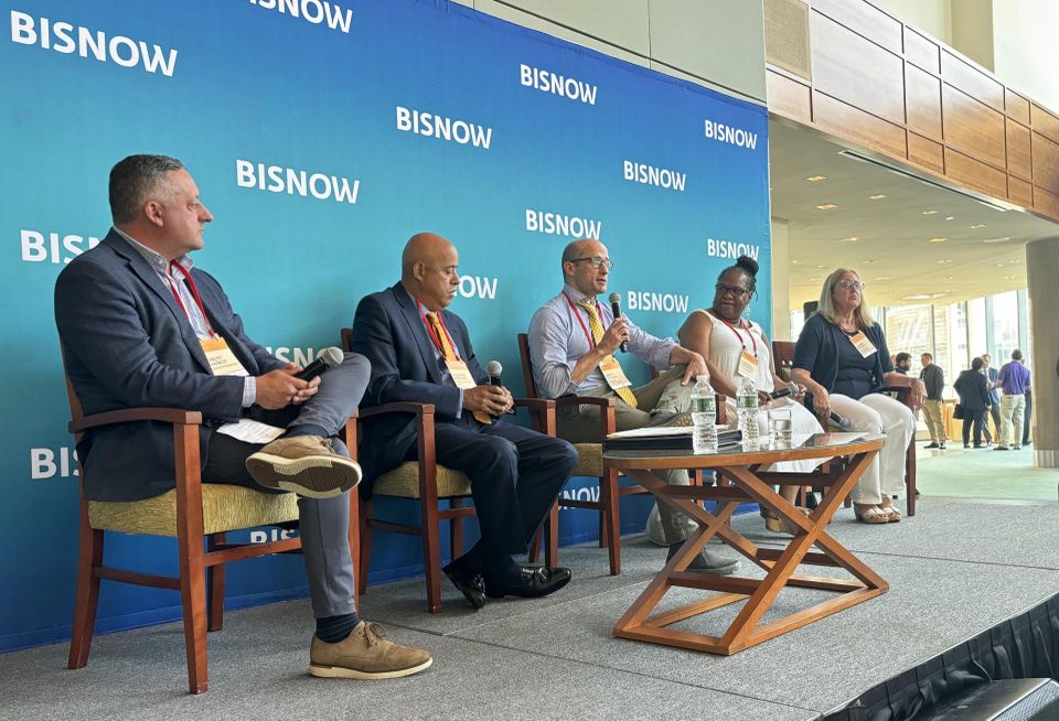 Boston Financial's Robert Charest, Rockland Trust Bank's Richard Muraida, Beacon Communities' Josh Cohen, MassHousing's Chrystal Kornegay and Sullivan & Worcester's Karen Kepler.
