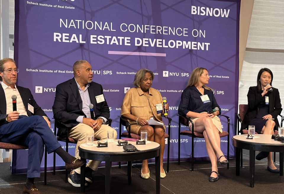 Slate Property Group's David Schwartz, Monadnock Construction's Kirk Goodrich, Fried Frank's Anita Laremont, MSquared's Carolee Fink and Jonathan Rose Cos.' Jenny Wu onstage at Bisnow and NYU Schack Institute For Real Estate's 2026 National Conference on Real Estate Development.