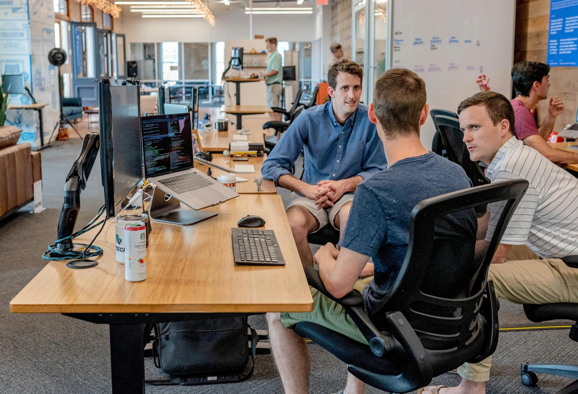 Men in shorts in office