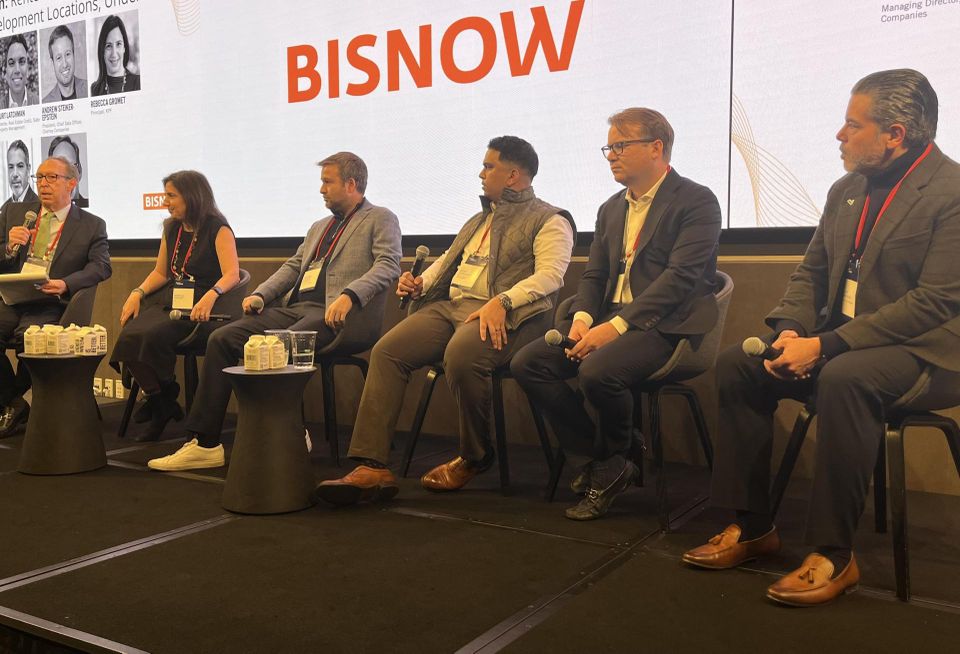 Belkin Burden's Martin Heistein, KPF's Rebecca Gromet, Charney Cos.' Andrew Steiker-Epstein, Slate Property Management's Kurt Latchman, Kushner Cos.' Ben Curtiss, and FirstService Residential's Jaime Sanmiguel onstage at Bisnow's 2026 New York Multifamily Development and Investment Conference.