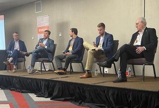 BMO Harris Bank's Shawn Oden, Cresa's Jeff Hartsook, Seagis Property Group's Bradlee Lord, ARCO/Murray's Buster Sheridan and TCRE's Mike Moore speak at Bisnow's South Florida industrial event Oct. 27, 2022.

