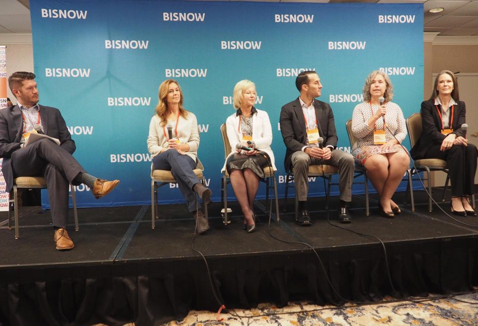 Walsh, Colucci, Lubeley & Walsh's Bob Brant, Cityline Partners' Donna Shafer, Mather's Gale Morgan, LCOR's Josh White, Fairfax County's Tracy Strunk and Federal Realty's Deirdre Johnson speak during a panel at Bisnow's Future of Tysons event on Dec. 1, 2022.