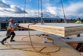 A cross-laminated timber panel being installed at The Canyons apartment community in Portland, Oregon.