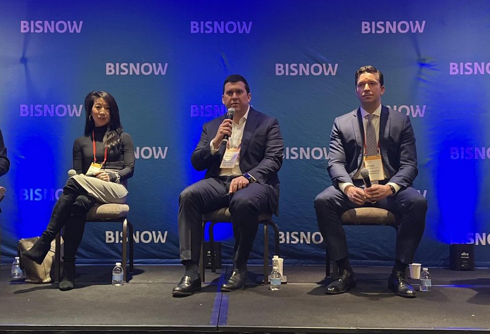 Empire State Realty Trust's Christina Chiu, Ivanhoé Cambridge's Michael Caracciolo and Cushman & Wakefield's Ethan Silverstein onstage at Bisnow's 2024 New York Forecast event.