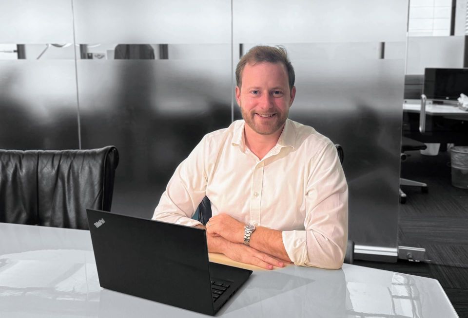 Chicago Atlantic's managing director and REIT co-resident Peter Sack at his desk.