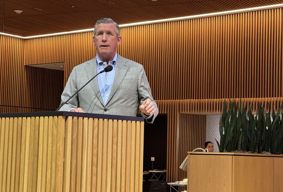 President & CEO of Texas Medical Center William F. McKeon speaking at a lectern.