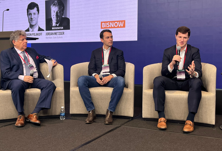 Cole Schotz' Jordan Metzger, The Davis Cos.' Andrew Kurd and Avison Young's Brandon Polakoff onstage at Bisnow's 2025 New York City State of the Market event.