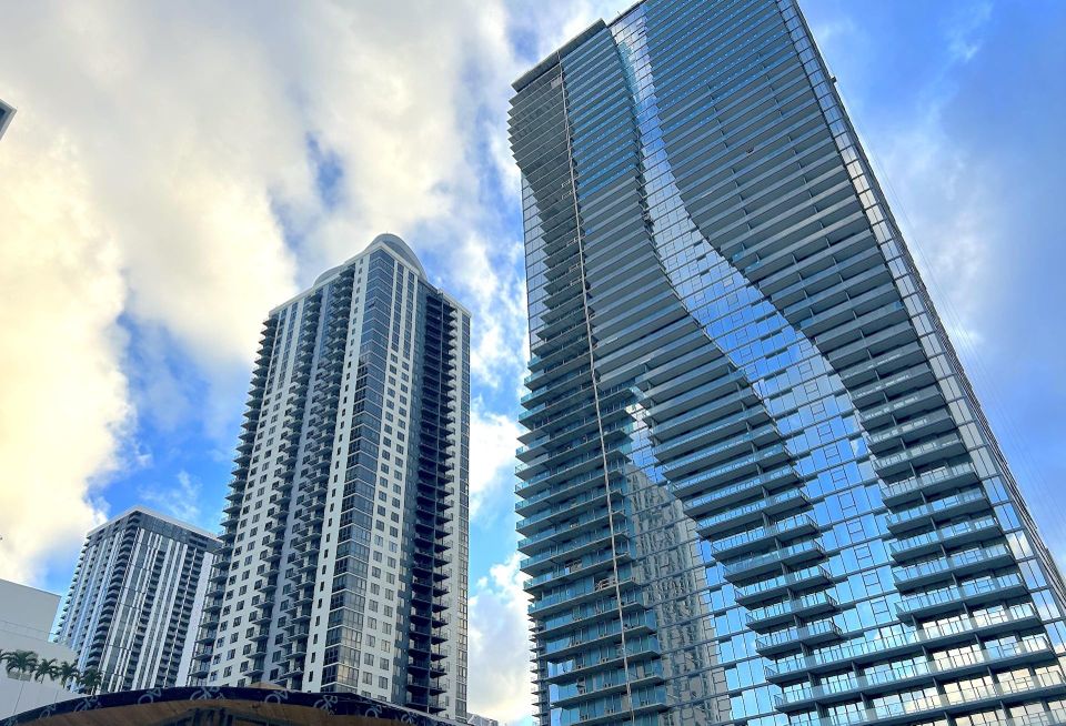 Miami World Tower 1, right, is slated to deliver lated this year as the first of four towers from Lalezarian Properties.