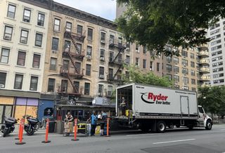 A truck makes deliveries to e-commerce customers in Manhattan.