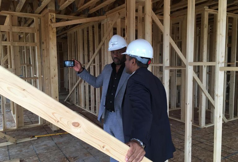 Yoba on site in Baltimore with Dan Bythewood of La Cité Development. 