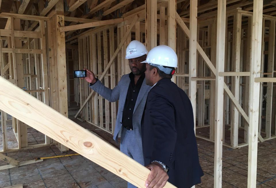Yoba on site in Baltimore with Dan Bythewood of La Cité Development.