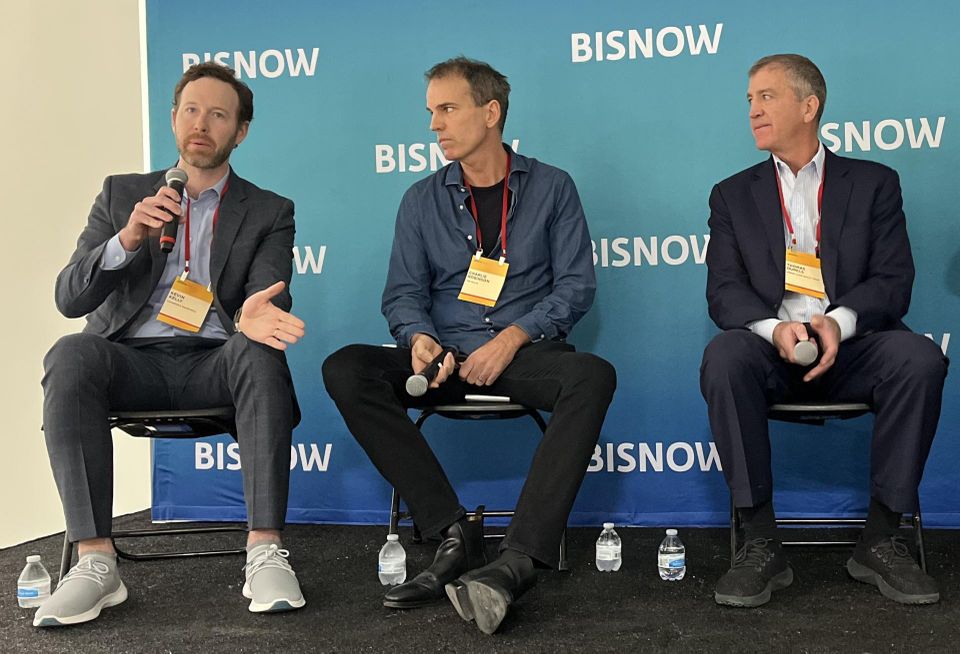 Cushman & Wakefield's Kevin Kelly, The Malin's Charlie Robinson and Empire State Realty Trust's Thomas Durel onstage at Bisnow's 2023 New York Office event.