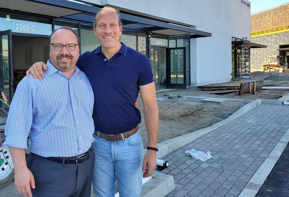 Primestor Development founders Leandro Tyberg and Arturo Sneider stand at the site of the Freedom Plaza, which was under construction in 2019